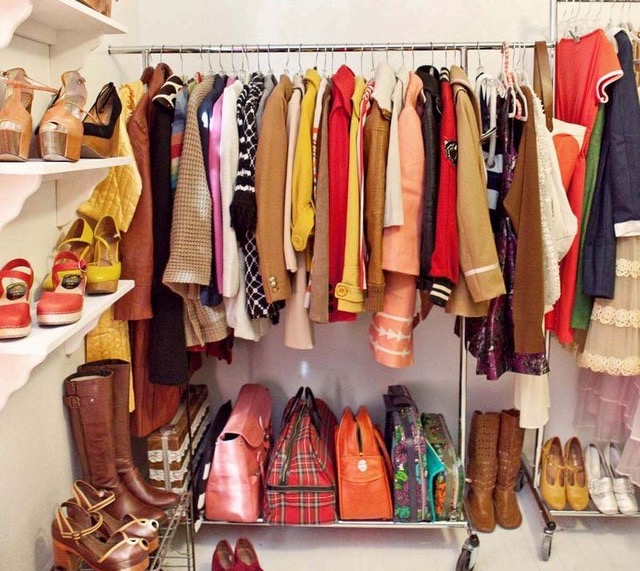 closet with clothes, shoes, bags